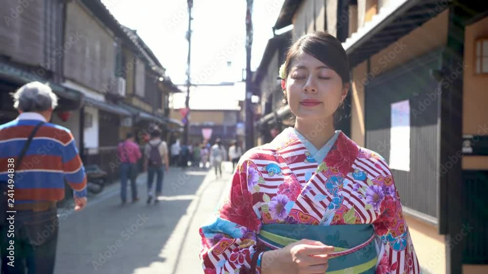 Urban city lifestyle asian woman in kimono costume walking on downtown street in kyoto japan. Happy young adult wearing japanese traditional dress kiyomizu zaka. teeming area many tourists visit. Urban city lifestyle asian woman in kimono costume walking on downtown street in kyoto japan. Happy young adult wearing japanese traditional dress kiyomizu zaka. teeming area many tourists visit.