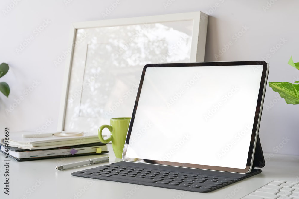 Workspace with mockup blank screen tablet Workspace with mockup blank screen tablet
