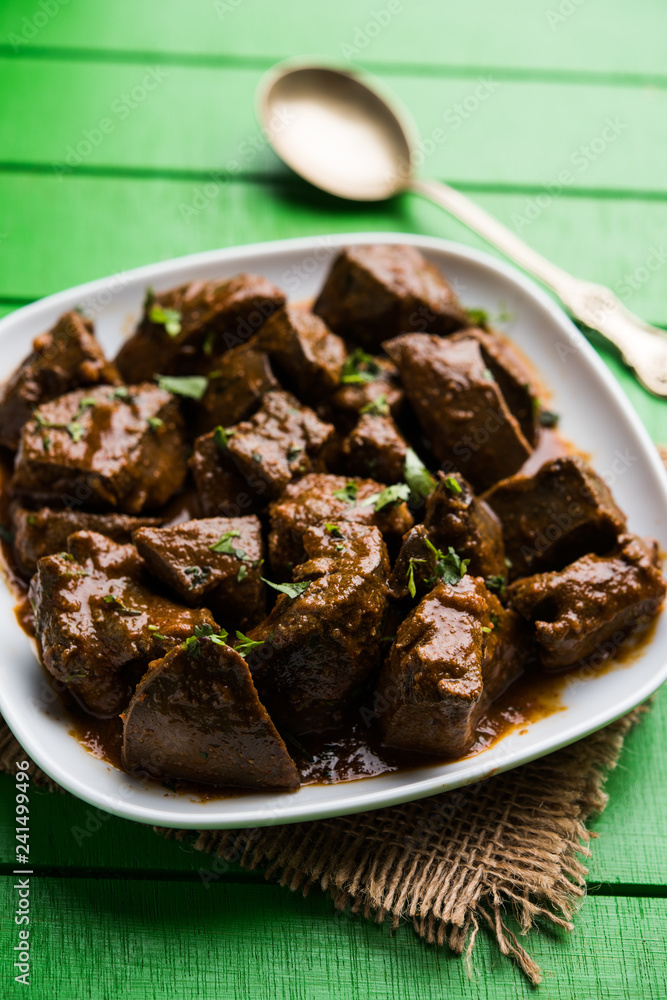 Mutton Liver fry or Kaleji masala, popular Non vegetarian recipe from India and Pakistan. served dry or with curry in a bowl, karahi or plate Mutton Liver fry or Kaleji masala, popular Non vegetarian recipe from India and Pakistan. served dry or with curry in a bowl, karahi or plate