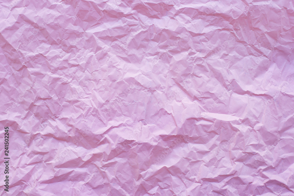 Fototapeta premium Pink crumpled recycle paper