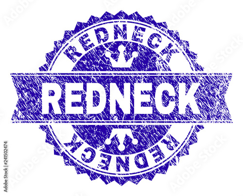 REDNECK rosette stamp watermark with distress style. Designed with round rosette, ribbon and small crowns. Blue vector rubber watermark of REDNECK text with scratched style.