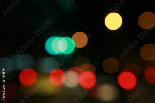 Bokeh. Night light abstract background. Bokeh of light in traffic jam. Element design to background website and banner © monster_code