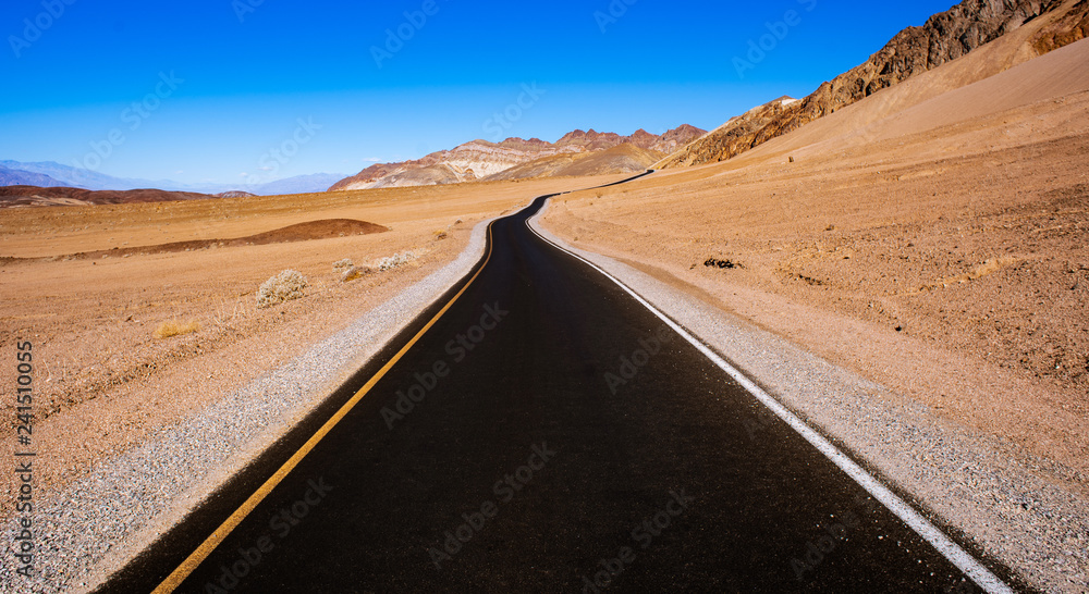 Windy road through the desert.
