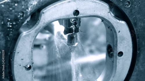 Milling abutment close-up. Cutting and milling of titanium abutment crown base for dental implant. Modern technology cad cam