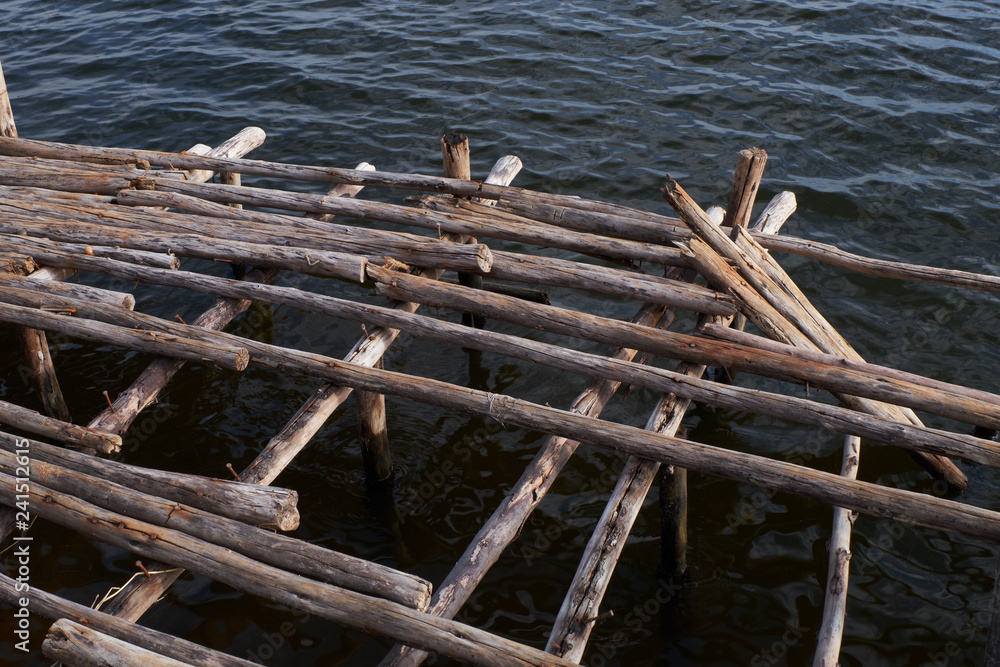 The pier is broken at the water's edge The pier is broken at the water's edge