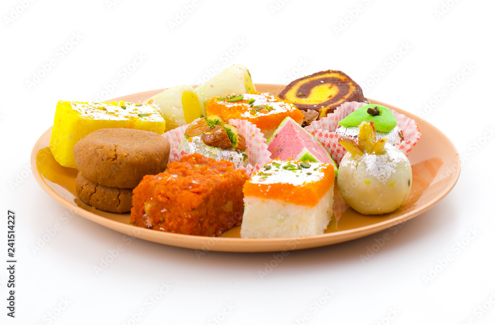 Indian Traditional Mix Sweet Food or Mix Mithai include Peda, Mawa Burfi, Dry Fruits Sweet, Halwa or Coconut Burfi Indian Traditional Mix Sweet Food or Mix Mithai include Peda, Mawa Burfi, Dry Fruits Sweet, Halwa or Coconut Burfi