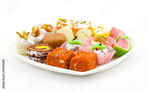 Indian Traditional Mix Sweet Food or Mix Mithai include Peda, Mawa Burfi, Dry Fruits Sweet, Halwa or Coconut Burfi photo