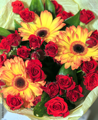 Bouquet of red roses and orange gerbera