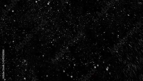 Snowfall on a black background photo