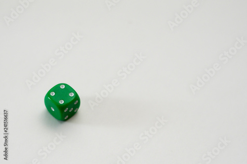 dice green on a white background