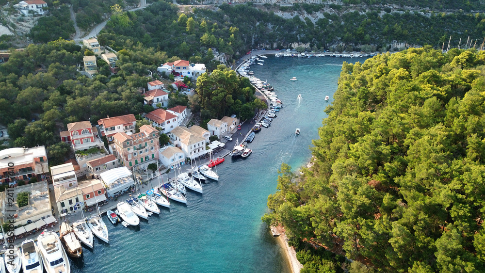 Aerial drone photo of iconic seaside village of Gaios, a safe harbor for yachts and sailboats, Paxos island, Ionian, Greece Aerial drone photo of iconic seaside village of Gaios, a safe harbor for yachts and sailboats, Paxos island, Ionian, Greece