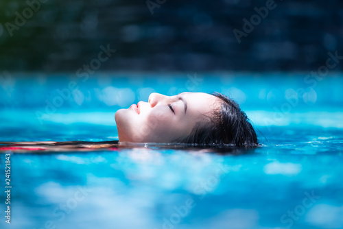 Young asian woman relaxing ...