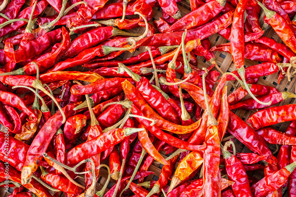 Dried red hot chilli pepper closeup background Dried red hot chilli pepper closeup background