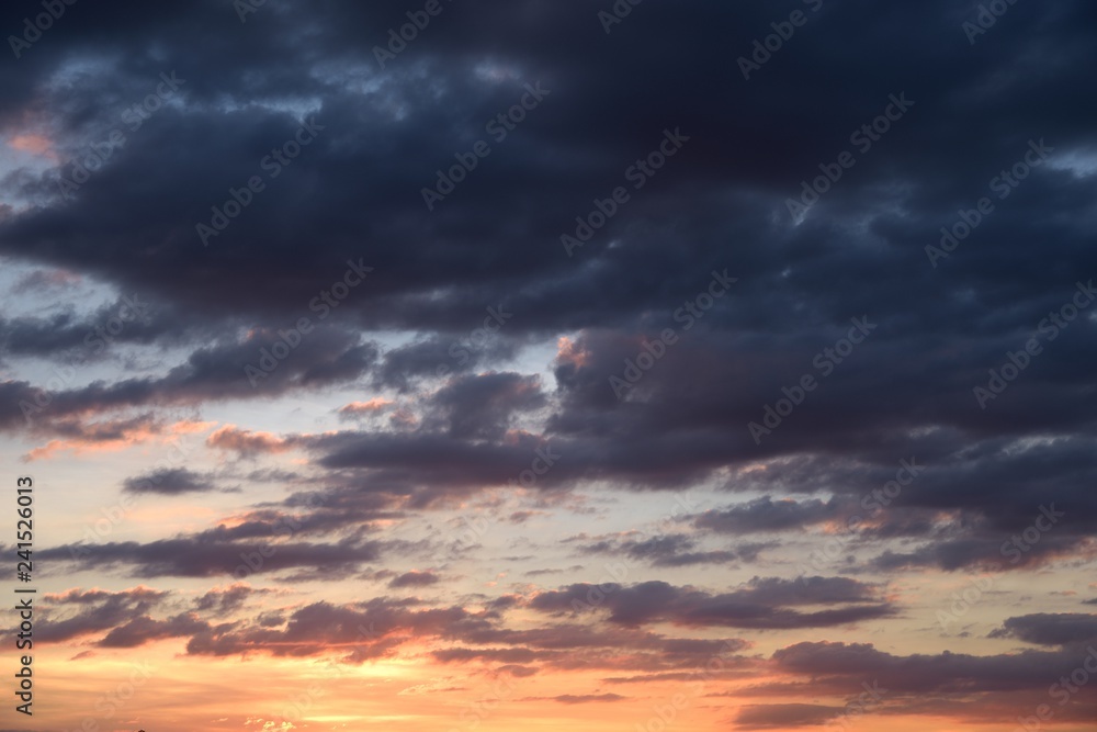 blue and orange cloud on sunset