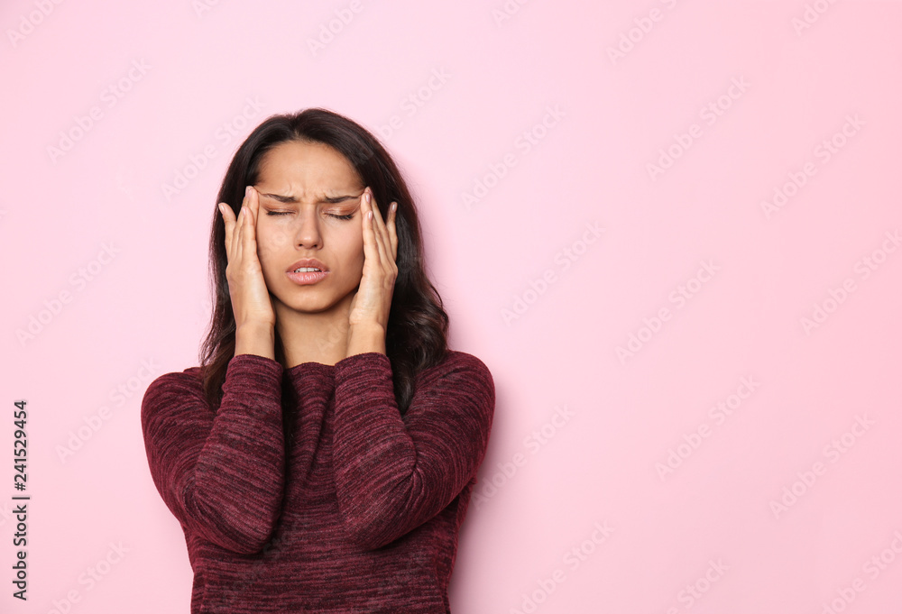 Stressed young woman on color background Stressed young woman on color background