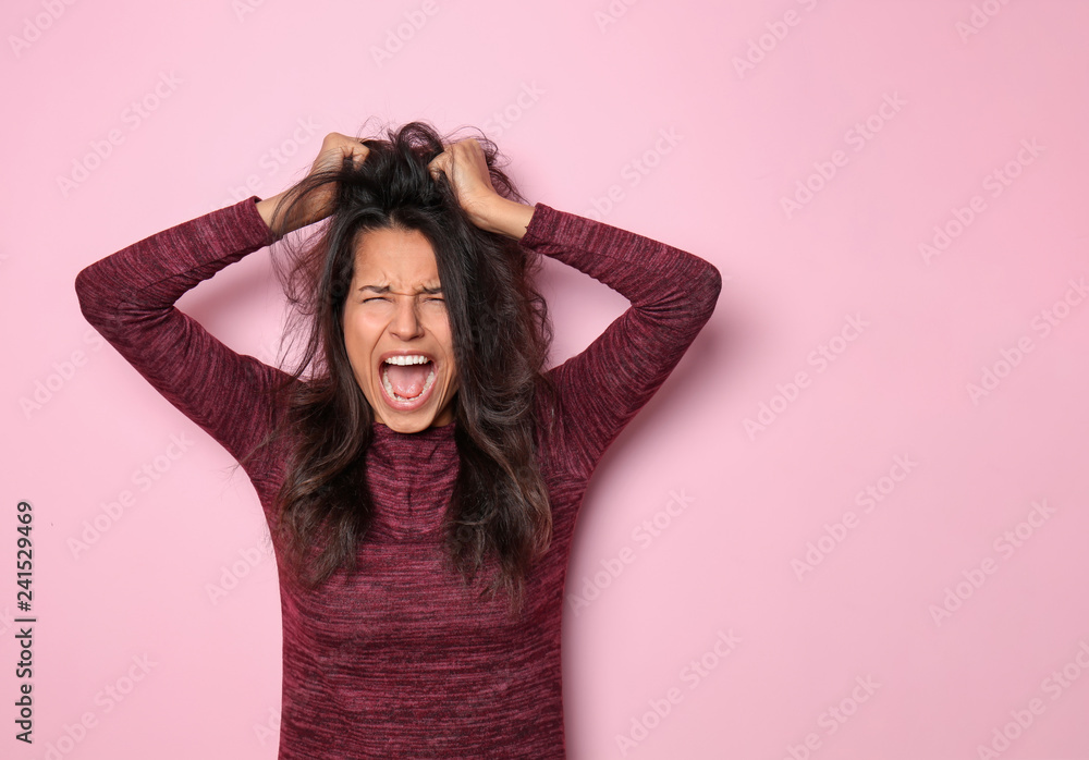 Screaming young woman on color background Screaming young woman on color background