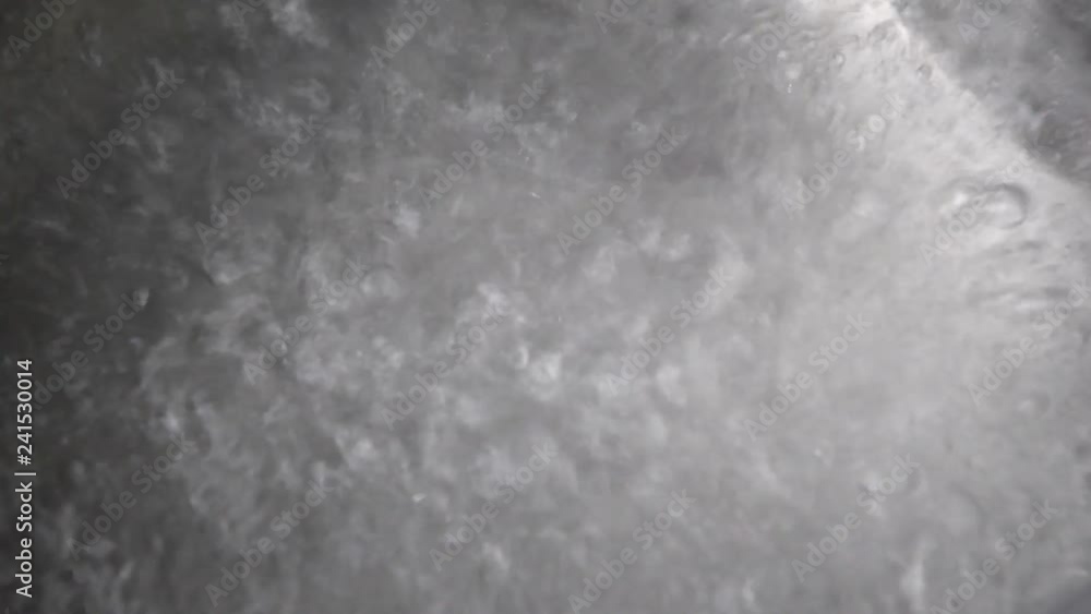 Clean boiling water in a pan close-up 4k resolution Clean boiling water in a pan close-up 4k resolution