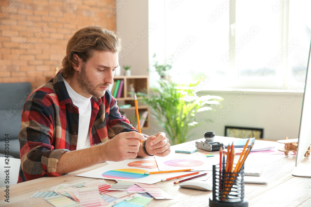 Young designer working in office Young designer working in office