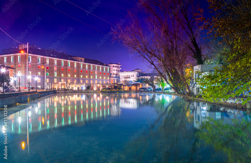 The Lake of Agia Varvara with the old tobacco factory in Drama City Central Park, Greece