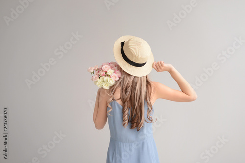 Beautiful young woman with ...