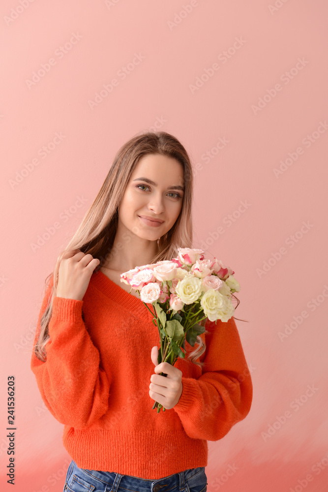 Beautiful young woman with bouquet of flowers on color background Beautiful young woman with bouquet of flowers on color background