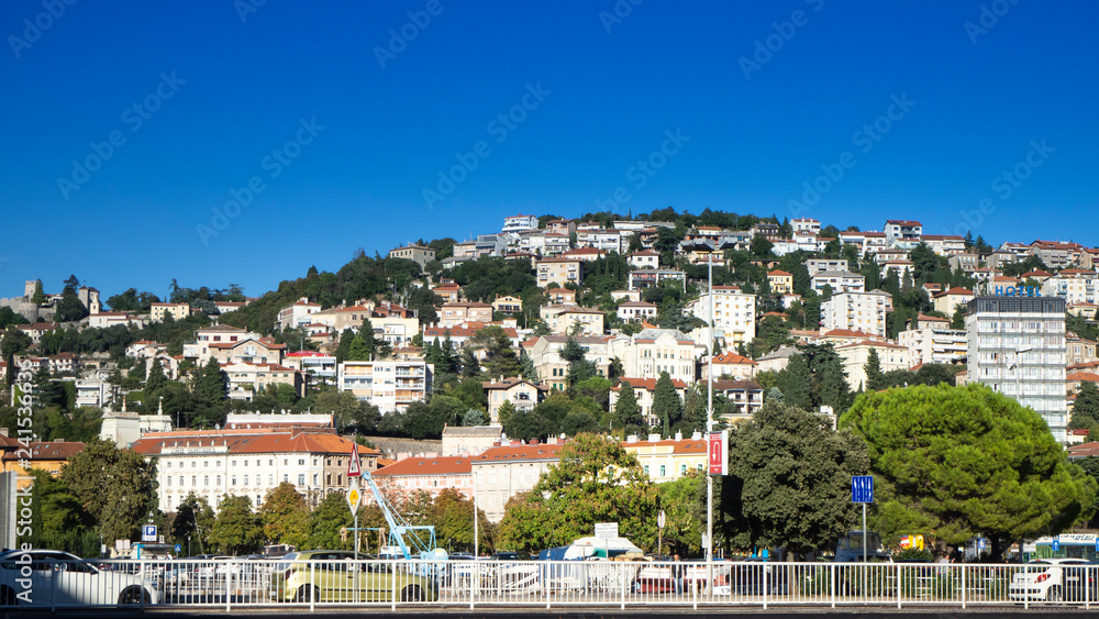 View over the Cityscape of some Houses on a Hill in the Harbor City of Rijeka in Croatia