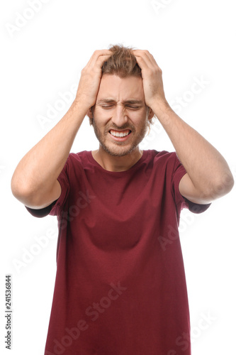 Young man suffering from he...