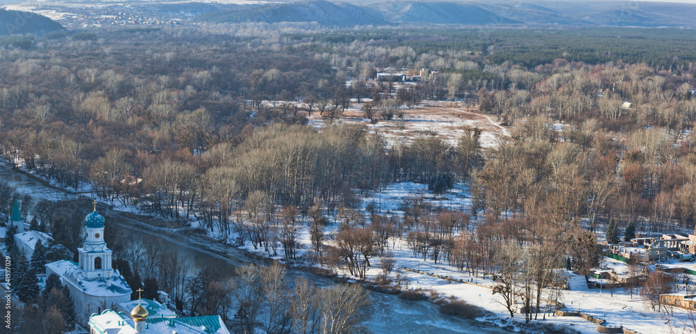 Sviatohirsk Lavra on the shore of the Seversky Donets in the winter. Top view
