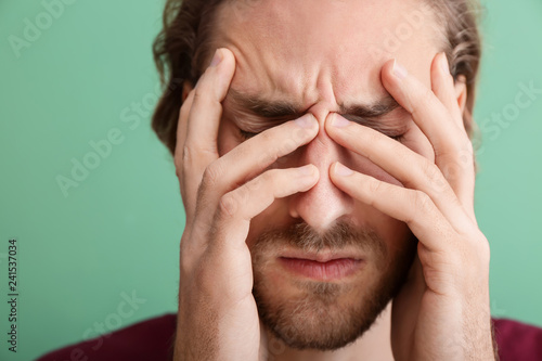 Young man suffering from he...