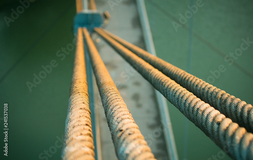 rope cable with steel bridge across a river