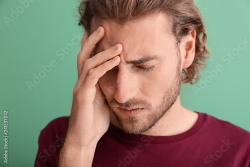 Young man suffering from he...