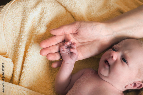 Mothers and newborn babys hands