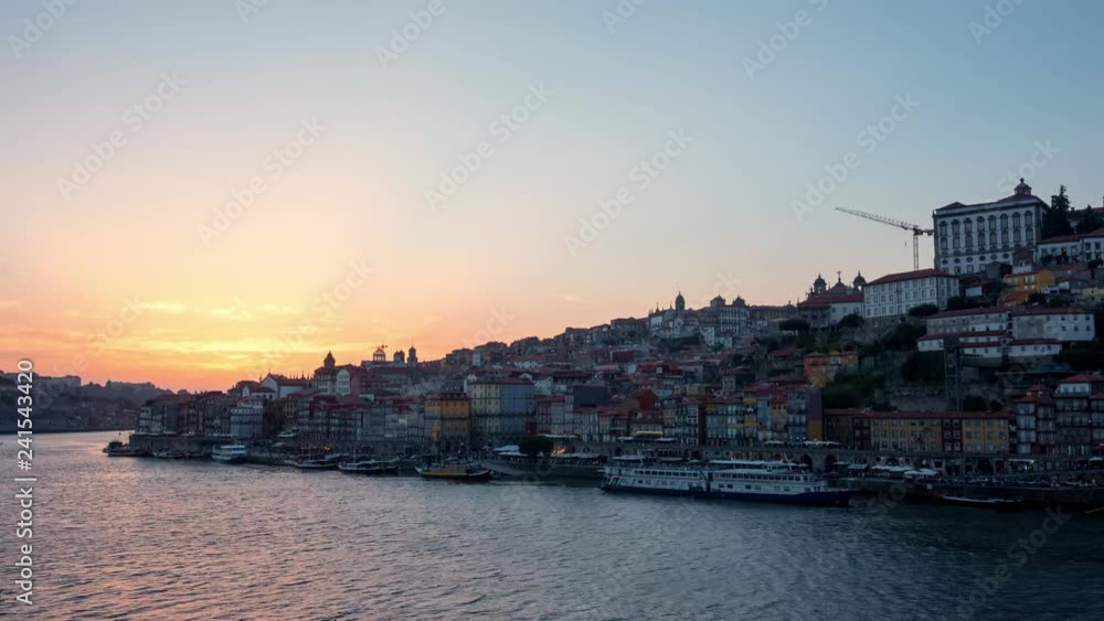 Amazing sunset over the Oporto old city skyline on the Douro River, Portugal Amazing sunset over the Oporto old city skyline on the Douro River, Portugal