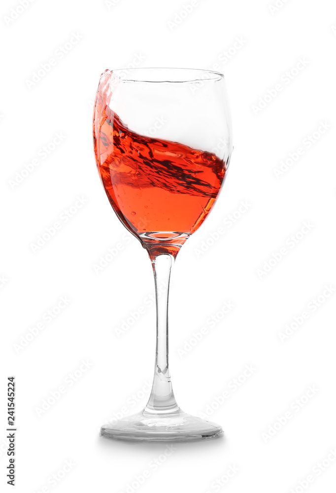 Glass with red splashing wine on white background Glass with red splashing wine on white background