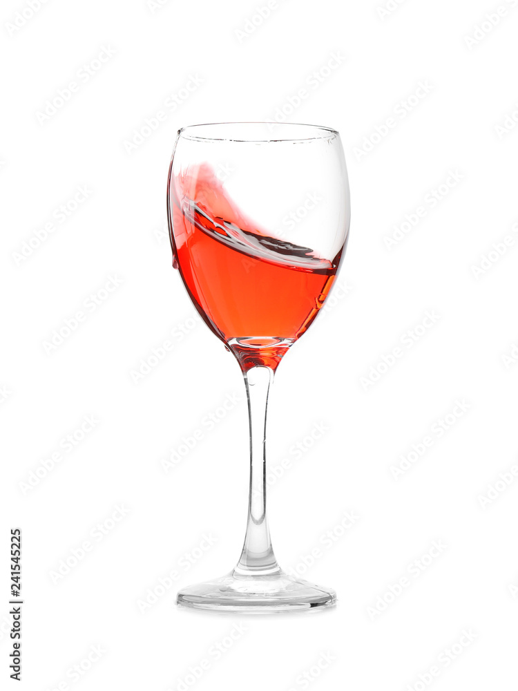 Glass with red splashing wine on white background Glass with red splashing wine on white background