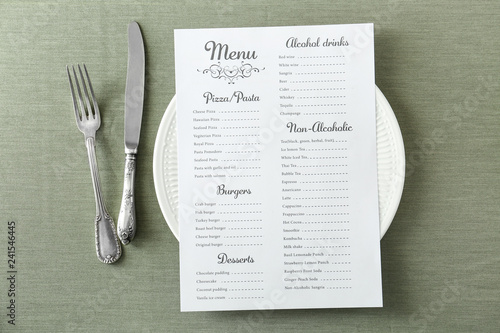 Menu on served table in restaurant
