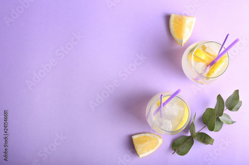 Composition with tasty lemonade on color background © Pixel-Shot
