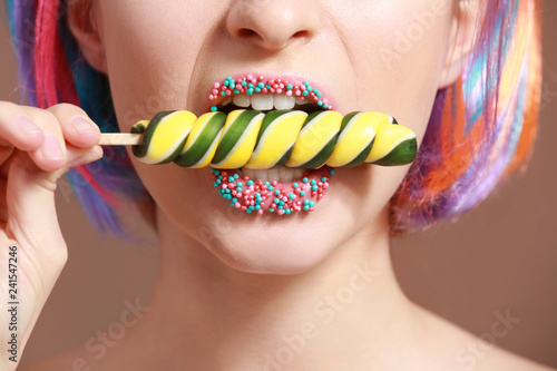 Beautiful young woman with ...