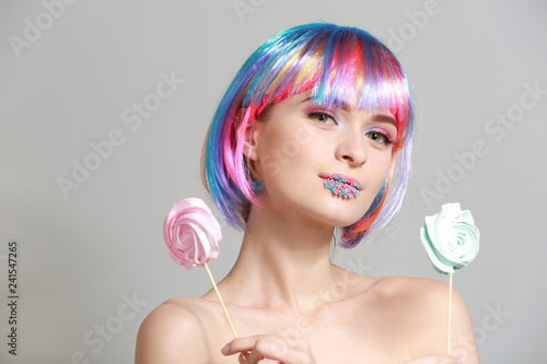 Beautiful young woman with ...