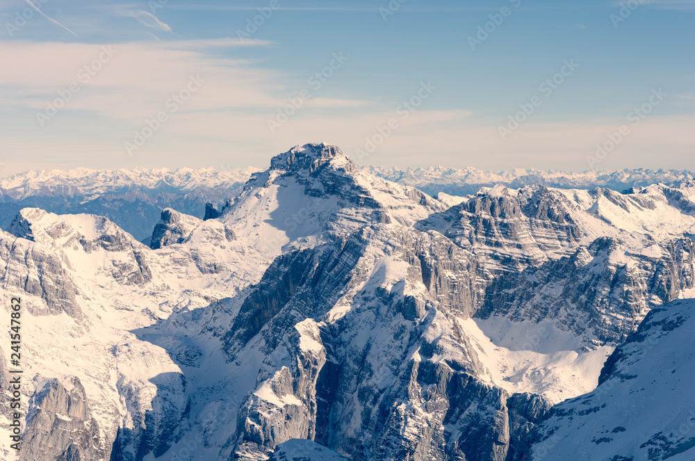 Naklejka premium Spectacular winter mountain panorama with peaks covered with early snow.