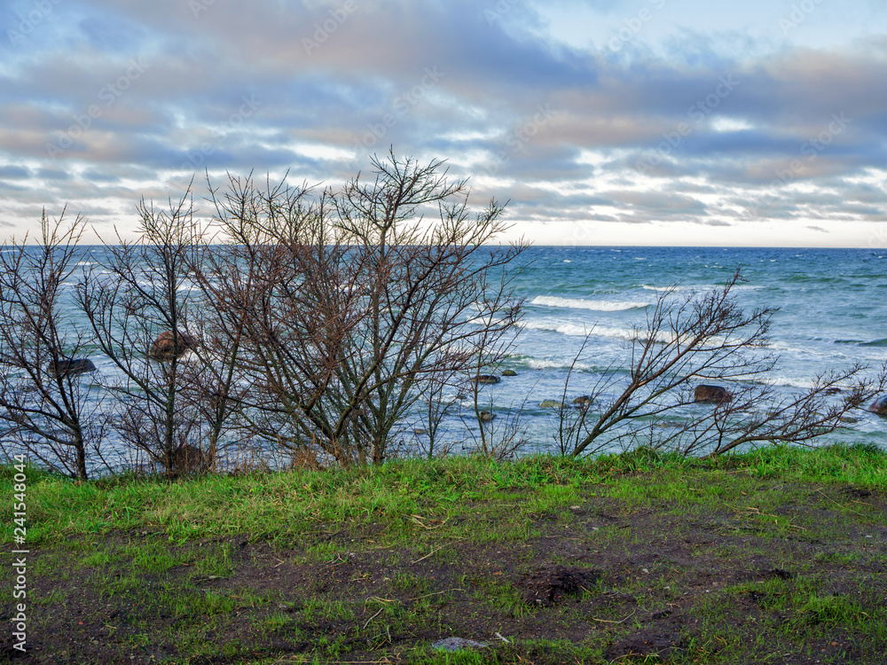 Baltic coastline under a partly cloudy sky