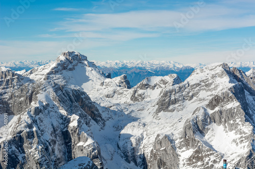 Spectacular winter mountain panorama with peaks covered with early snow. © anzebizjan