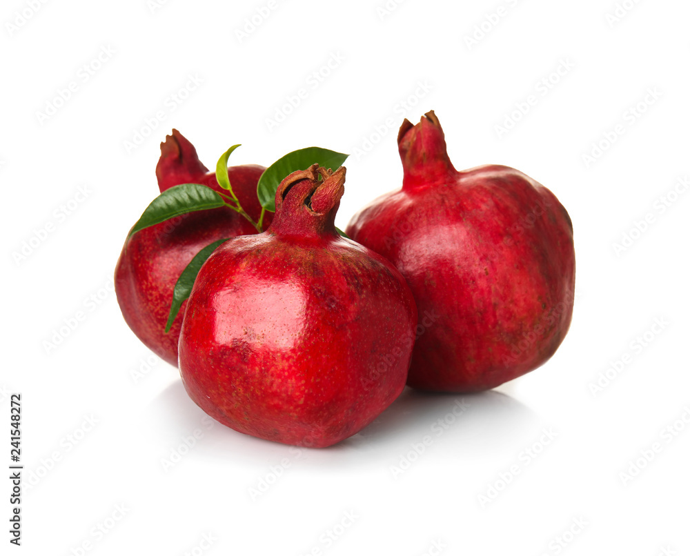 Ripe pomegranates on white background Ripe pomegranates on white background