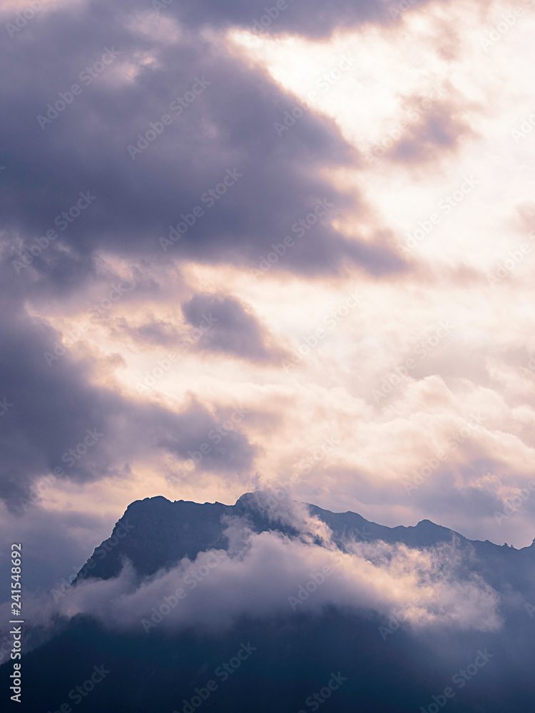 Mountain peak dominated by clouds Mountain peak dominated by clouds