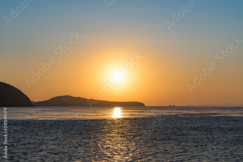 Winter seascape with ice floes on the water surface.