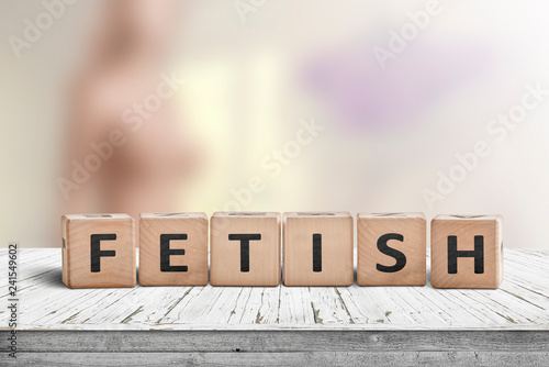 Fetish word on wooden cubes on a table