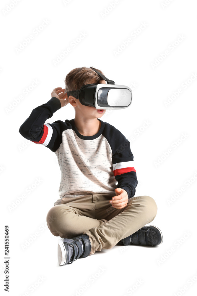Cute boy with virtual reality glasses on white background Cute boy with virtual reality glasses on white background