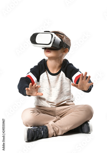 Cute boy with virtual reali...