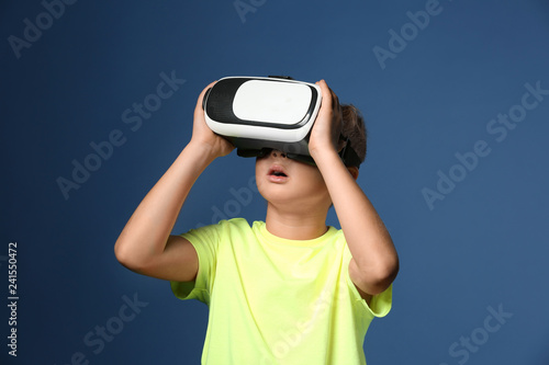 Cute boy with virtual reali...
