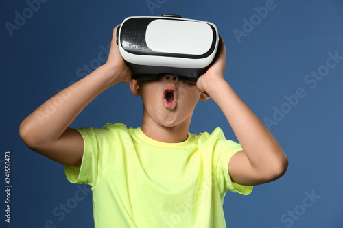 Cute boy with virtual reali...